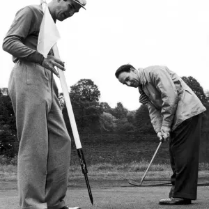 Birmingham Mail film critic Arthur Steele plays golf with Stanley Baker in Richmond Birmingham Mail film critic Arthur Steele plays golf with Stanley Baker in Richmond