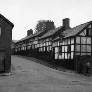 Black and white cottages in the town of Llandidloes in Montgomeryshire, Wales Black and white cottages in the town of Llandidloes in Montgomeryshire, Wales