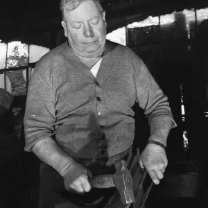 Blacksmith Horace Tubby Lovegrove seen here at work at his forge Blacksmith Horace Tubby Lovegrove seen here at work at his forge