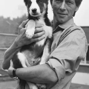 Blue Peter presenter John Noakes, seen here with the programmes new border collie puppy