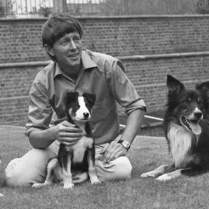 Blue Peter presenter John Noakes, seen here with the programmes new border collie puppy