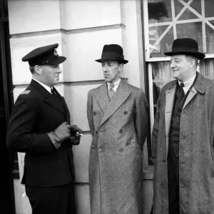 One of the BOAC flying boat crew chats with passengers before boarding a flight at Poole