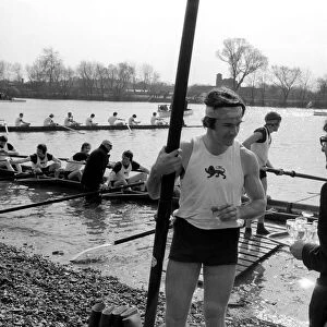 Boat Race Cambridge. Some of the Cambridge team members celebrate with Champagne after