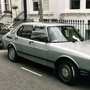 Bob Geldof silver Saab 900 car owned by Bob with broken drivers window covered with