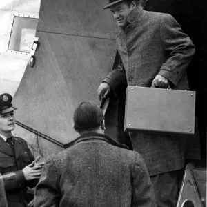 Bob Hope - American film star and comedian Bob Hope is pictured descending from an Bob Hope - American film star and comedian Bob Hope is pictured descending from an