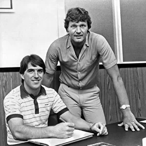 Bob Latchford signing for Swansea City after passing a medical check at the Vetch Field