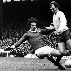 Bob McNab Football Player Arsenal Jan 1974 is tackled by Martin Buchan during a