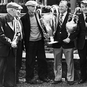 Bob Paisley former manager of Liverpool FC Football 1977 holding football trophies