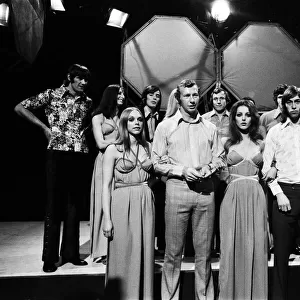 Bob Wilson and Charlie George in the front row of the chorus with Pan