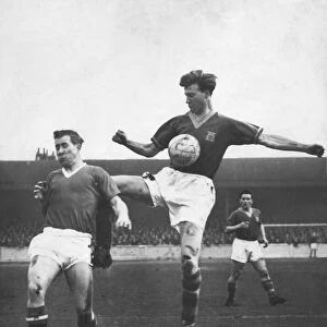 Bobby Charlton (left for Manchester United) in an action clash with his brother Jack