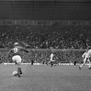 Bobby Charlton, in the number 9 shirt for Manchester United, at Old Trafford