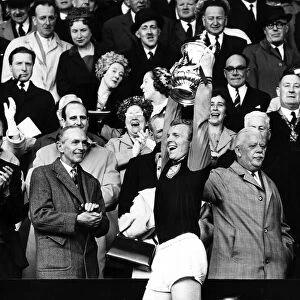 Bobby Moore captain of West Ham Utd lifts FA cup after beating Preston North End