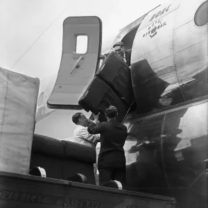 BOCA Boeing Strato Cruiser being adapted and loaded with supplies for flood victims in BOCA Boeing Strato Cruiser being adapted and loaded with supplies for flood victims in