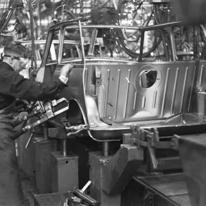Body panels for the Austin Mini seen here being welded on the production line Body panels for the Austin Mini seen here being welded on the production line