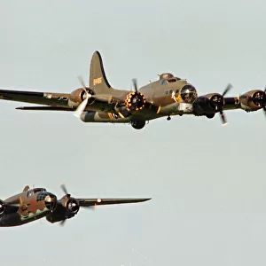 A Boeing B17 Flying Fortress (The Sally B) seen here flying in formation with a North