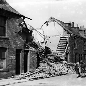 Bomb-shattered homes in Grange Street, Hull. Circa 1941