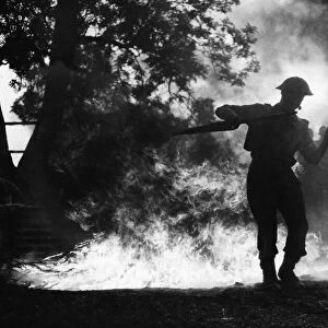 Bomber Command Battle School. (Picture) Airman crossing a fire trench