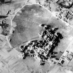Bombs exploding on a Nazi aircraft engine plant near Brussels in Belgium Bombs exploding on a Nazi aircraft engine plant near Brussels in Belgium