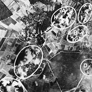 Bombs from United States Army Air Force Flying Fortresses falling on the German occupied