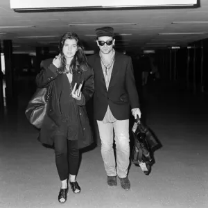 Bono of rock group U2 and his wife Ali pictured at London Airport. 16th July 1987 Bono of rock group U2 and his wife Ali pictured at London Airport. 16th July 1987