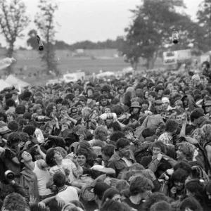 Bottles being thrown in the audience at Monsters of Rock festival at Castle Donington