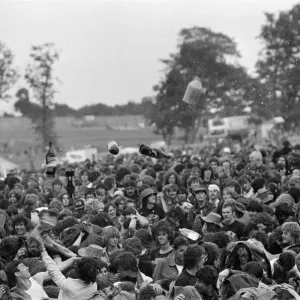 Bottles being thrown in the audience at Monsters of Rock festival at Castle Donington