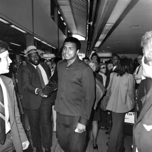 Boxer Cassius Clay. Heavyweight boxer Cassius Clay arrived at Heathrow Airport on his way