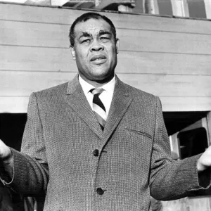 Boxer Joe Louis 1966 Former heavyweight champion of the world held up his hands