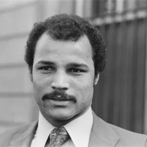 Black and white print of John Conteh leaving Bow Street Magistrate Court Black and white print of John Conteh leaving Bow Street Magistrate Court