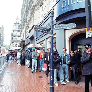 Boxing fans queue outside Dillions book store in Birmingham to see Muhammad Ali