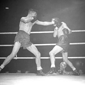Boxing match Eddie Thomas v Henry Hall November 1949 in the boxing ring boxc