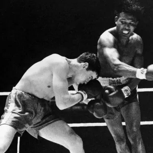 Boxing match at Empire Pool, Wembley, London, United Kingdom. Sugar Ray Robinson v Boxing match at Empire Pool, Wembley, London, United Kingdom. Sugar Ray Robinson v