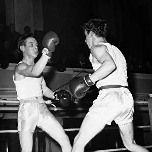 Boxing McCluskey throws a punch during a match with McAuley