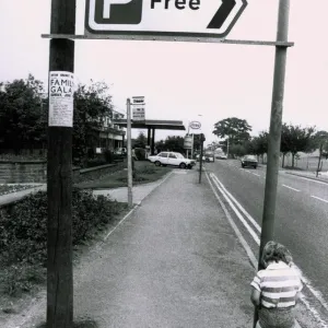 Humorous Print: A Boy Peeing on a Free Parking Sign Humorous Print: A Boy Peeing on a Free Parking Sign