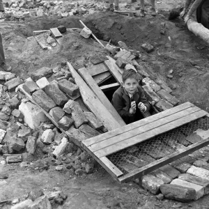 Boys playing at Clydesdale Road adventure playground. 18th May 1955 Boys playing at Clydesdale Road adventure playground. 18th May 1955