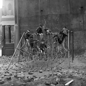Boys playing at Clydesdale Road adventure playground. 18th May 1955 Boys playing at Clydesdale Road adventure playground. 18th May 1955