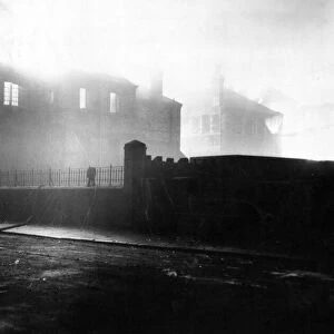 The boys school in Llandaff, Cardiff, ablaze after an air raid. March 1941