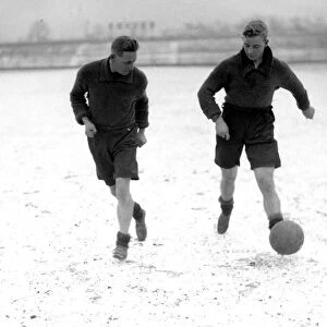 Bradford City FC. Taylor and Dickinson training in the snow. 11th February 1930