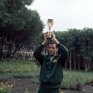 Brazil captain Carlos Alberto holds aloft the Jules Rimet World cup trophy following