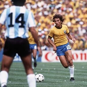 Brazil World Cup 1982 football Argentina v Brazil Zico on the ball as Jorge Olguin