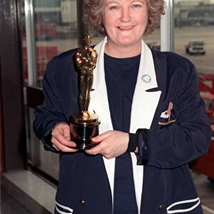 Brenda Fricker actress March 1990 celebrates winning her Oscar at Heathrow