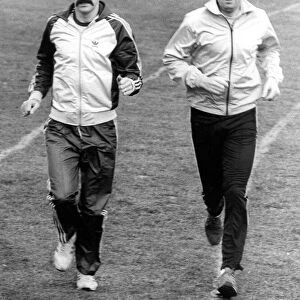 Brendan Foster (right) in a training run with Australian world corss country