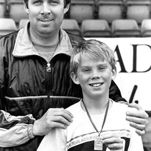 Brendan Foster with his son Paul after the Junior Great North race at Gateshead Stadium