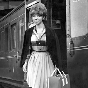 Brennan People. 21-year old Dilys Watling photographed at Manchester Central Station