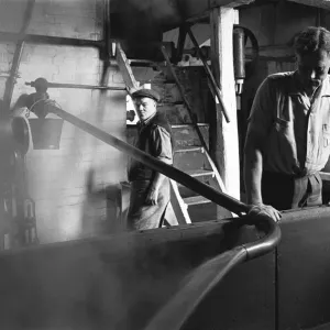 Brewer Claude Arkwell (right) seen hereat work at the Donnington Brewery Brewer Claude Arkwell (right) seen hereat work at the Donnington Brewery