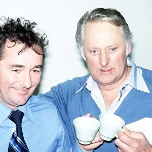 Brian Clough Football manager of Derby County with his assistant Peter Taylor holding tea