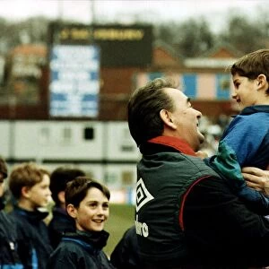 Brian Clough Football manager lifting up young fan Circa 1991