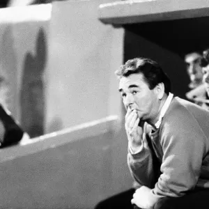 Brian Clough Football manager of Nottingham Forest FC sitting on team bench during match Brian Clough Football manager of Nottingham Forest FC sitting on team bench during match
