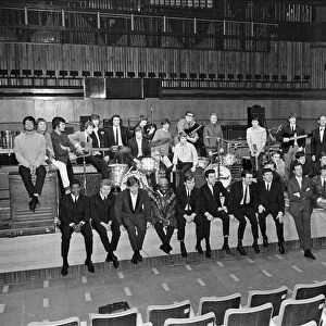 Brian Epstein (front row standing, sixth from the right right