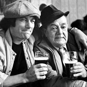 Brian Johnson lead singer of the rock group AC / DC shares a pint of beer with dad Alan 31